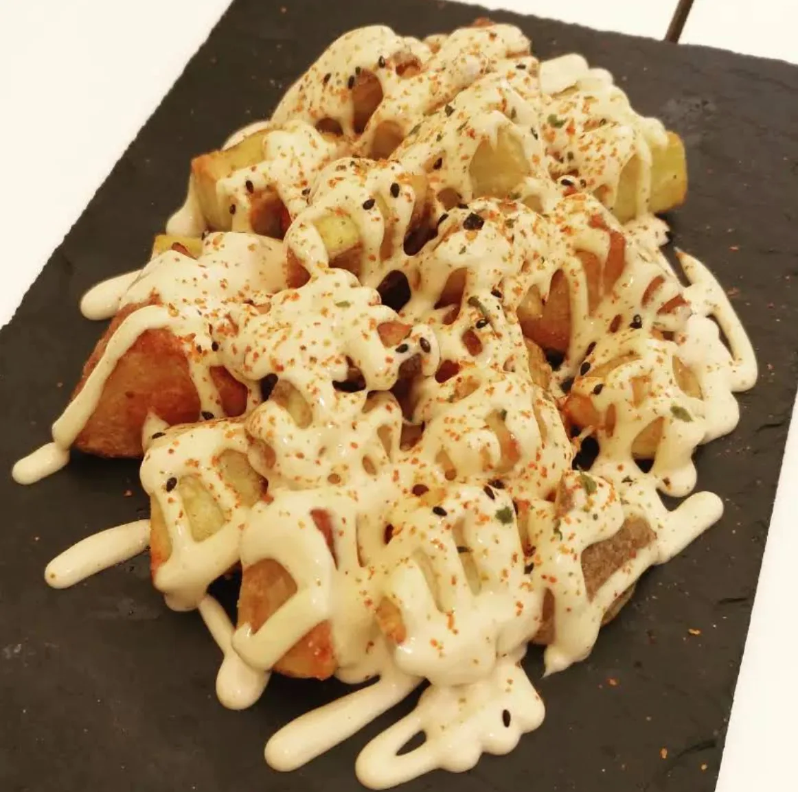 Foto de las bravas: t&b - Gastrobar en valencia